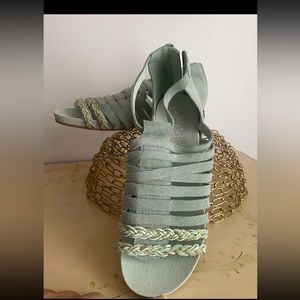 Worn once just a little bit for my wife. Size 10 and like new. Beautiful color.